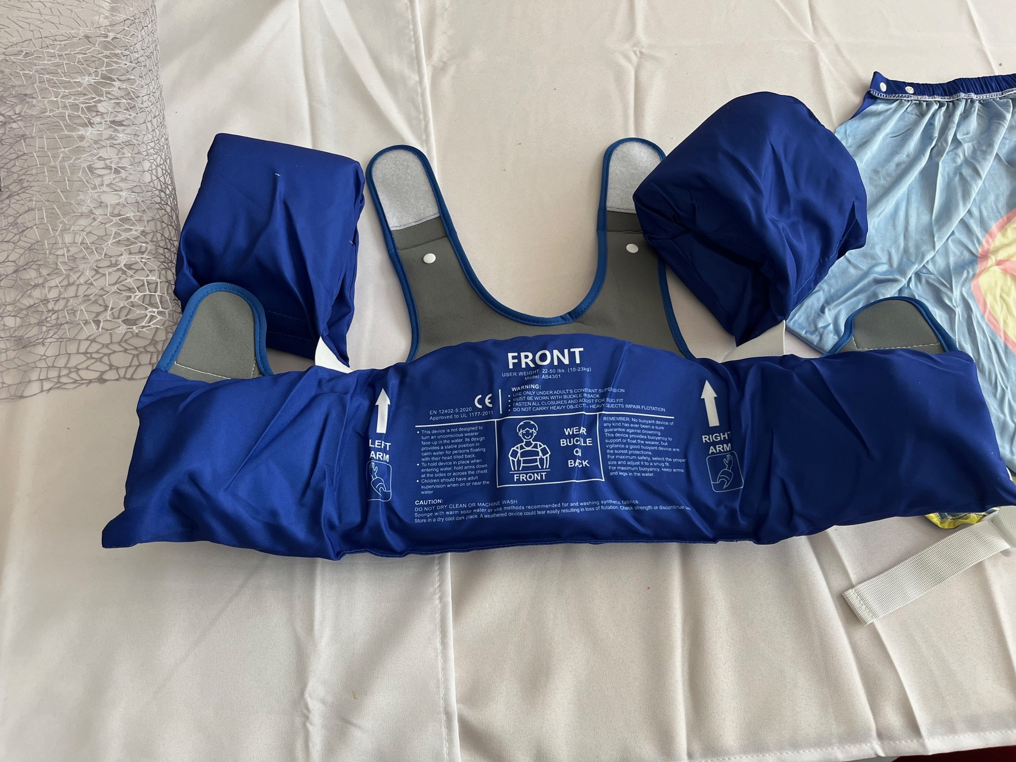 Imagen oficial de Swim vest ; Abuytwo ; Schwimmweste Kinder mit Umhang und Verstellbaren Schultergurten publicada por OECD 3