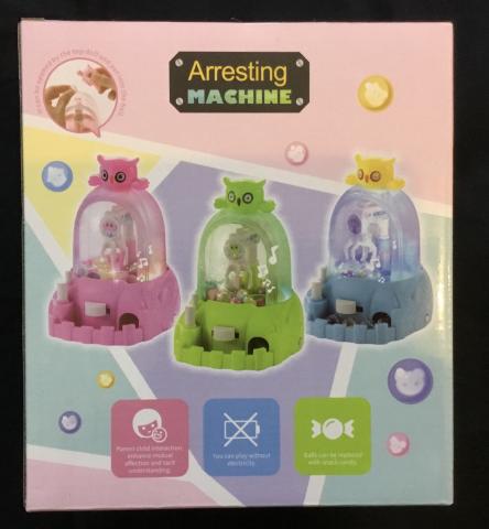Imagen oficial de Arresting Machine Toy publicada por OECD 3