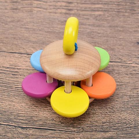 Imagen oficial de Montessori Wooden Rattles publicada por OECD 2