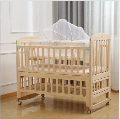 Imagen oficial de Baby Multi-functional Adjustable Cot Convertible Table Mattress Mosquito Net publicada por OECD