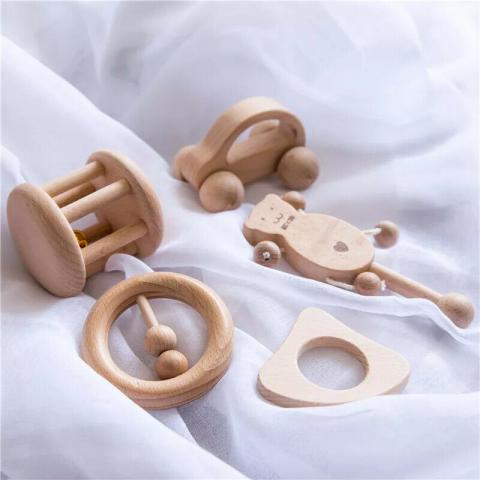 Imagen oficial de Montessori Newborn Baby Wooden Toys Gift Car Rattle Teether Set Neutral Learning publicada por OECD 2