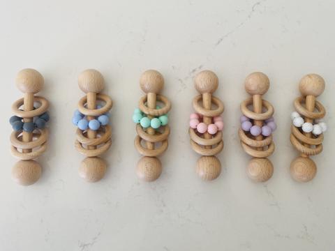 Imagen oficial de Wooden Baby Rattle publicada por OECD