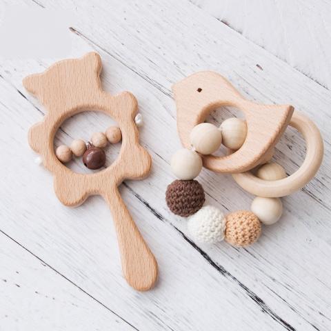 Imagen oficial de Cute Wooden Baby Teether publicada por OECD