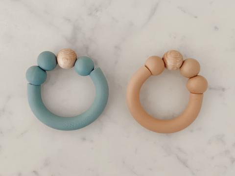 Imagen oficial de Various rattles and teething rings publicada por OECD 4