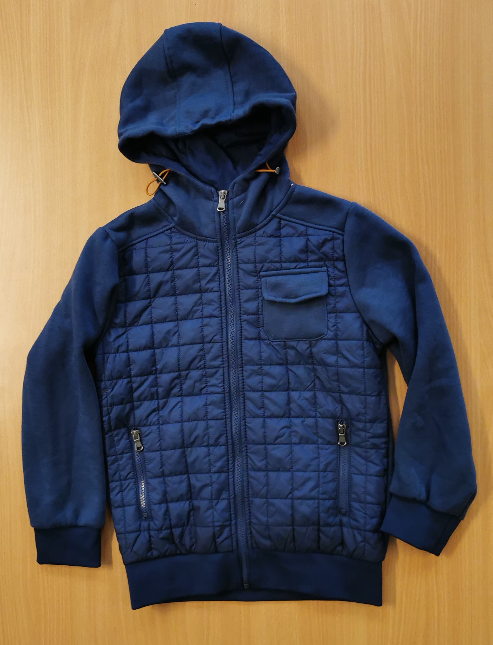 Imagen oficial de Children's hooded padded jacket ; TQF ; publicada por OECD 3