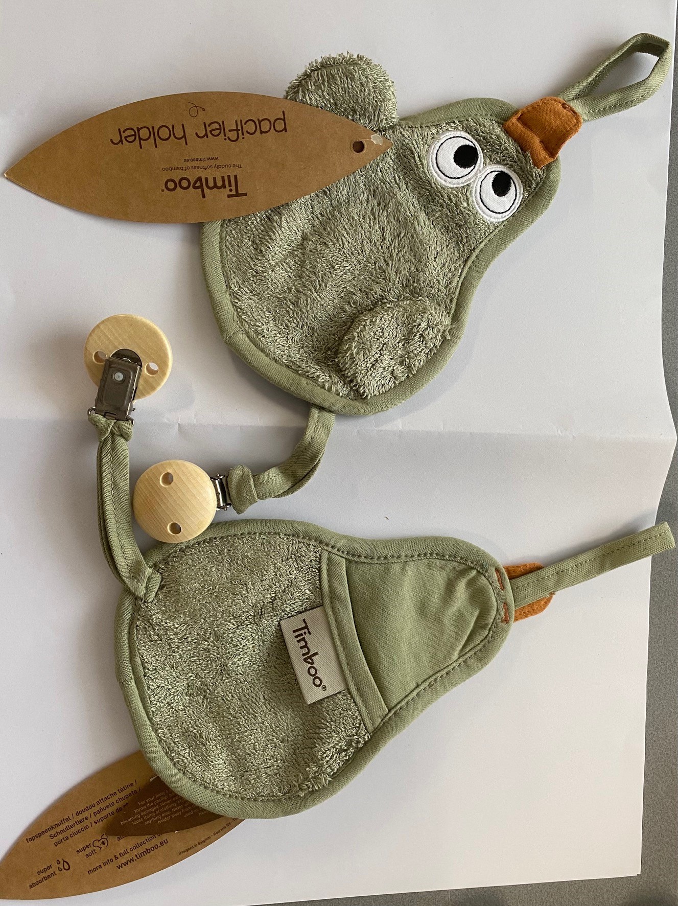 Imagen oficial de Soother holder ; Timboo ; PACIFIER HOLDER DUCK WHISPER GREEN publicada por OECD