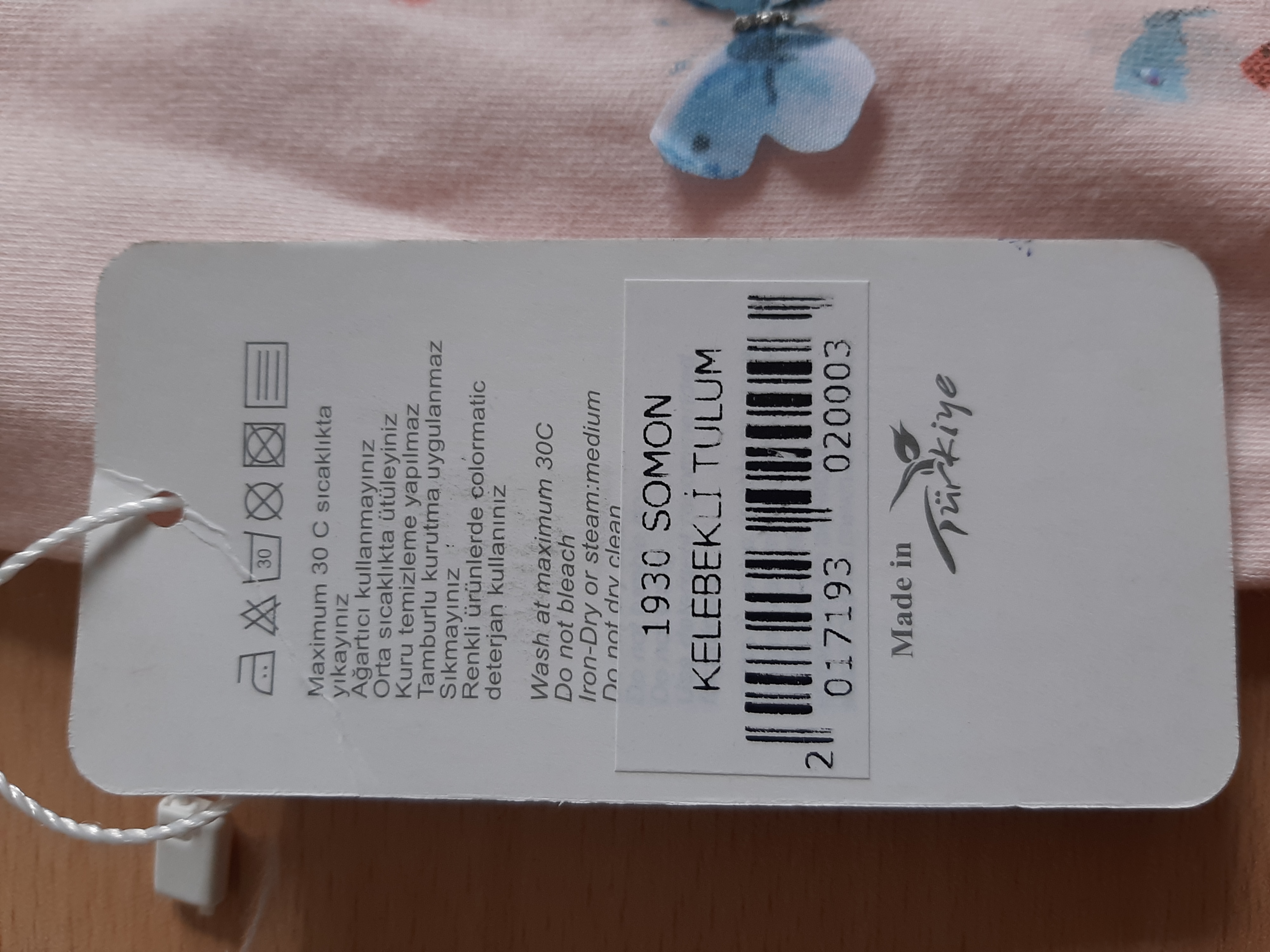Imagen oficial de Baby's bodysuit ; TONGS baby ; publicada por OECD 2