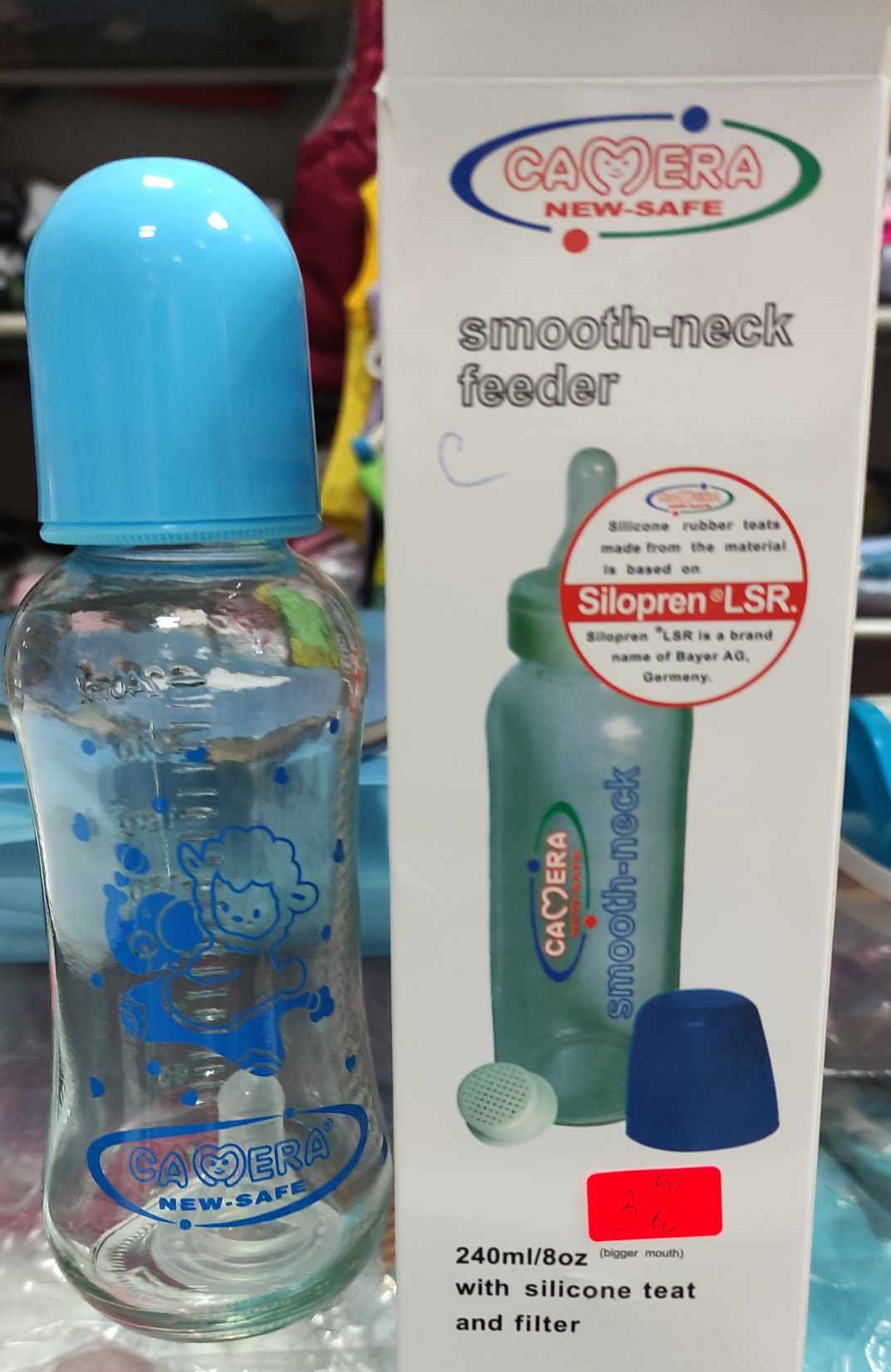 Imagen oficial de Baby bottle ; Camera ; New safe smooth-neck feeder publicada por OECD
