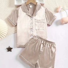 Imagen oficial de JUVENNO KIDS Children’s Button- up Short Sleeve/ Shorts Two Piece Pajama Sets publicada por OECD