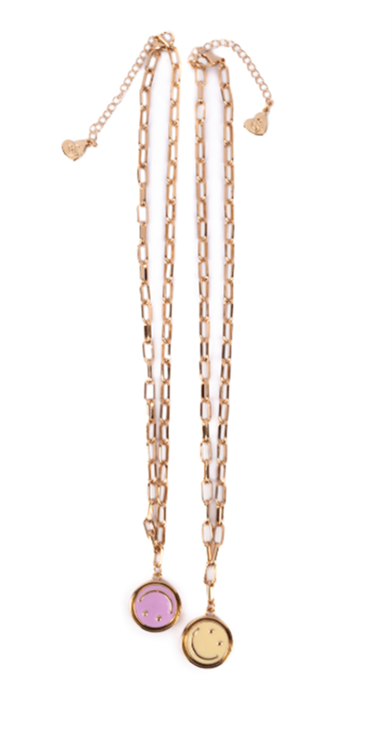 Imagen oficial de Boutique Chic All Smiles Spinner Necklace, Bracelet and Ring publicada por OECD