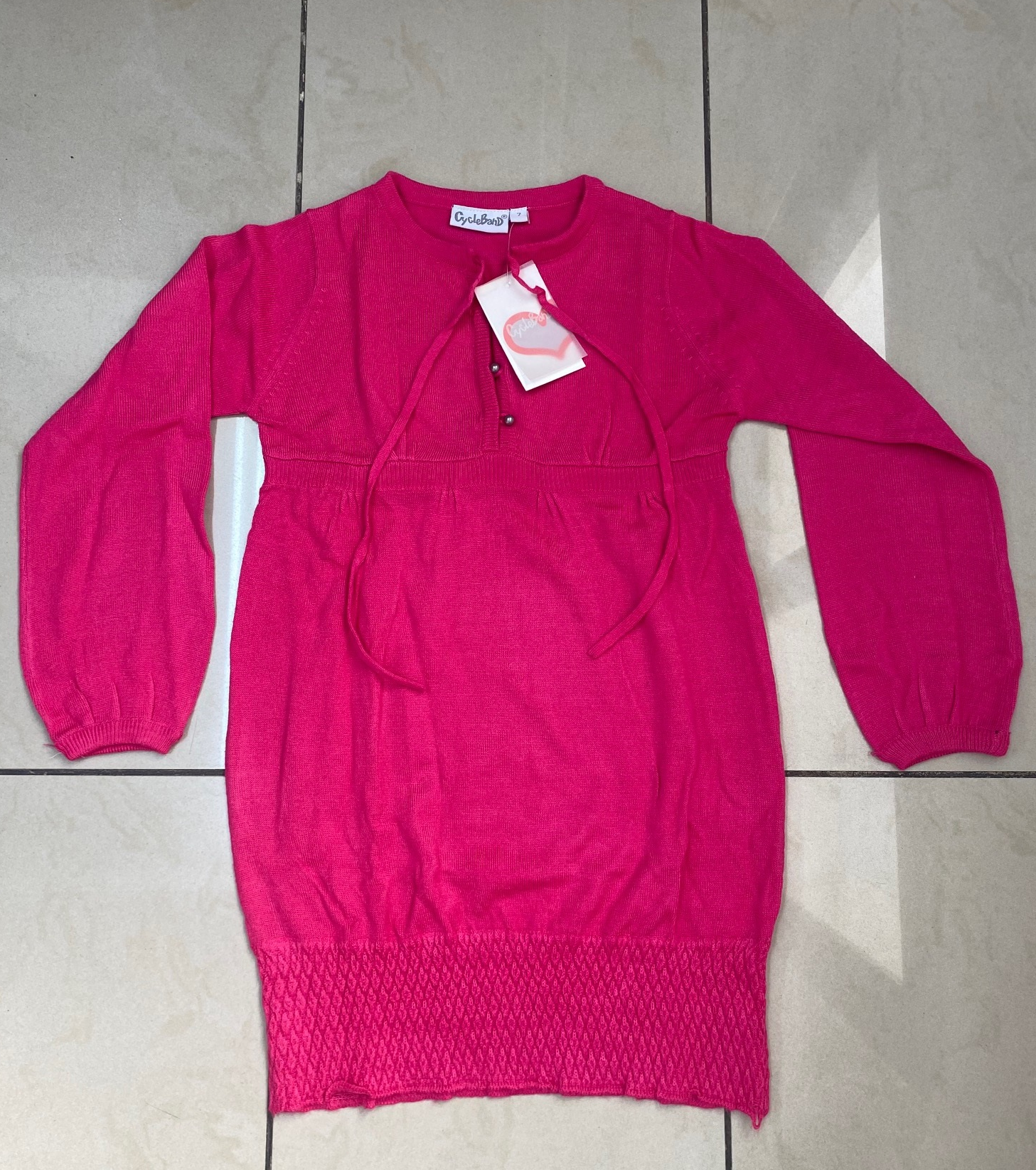 Imagen oficial de Children's dress ; CycleBand ; publicada por OECD
