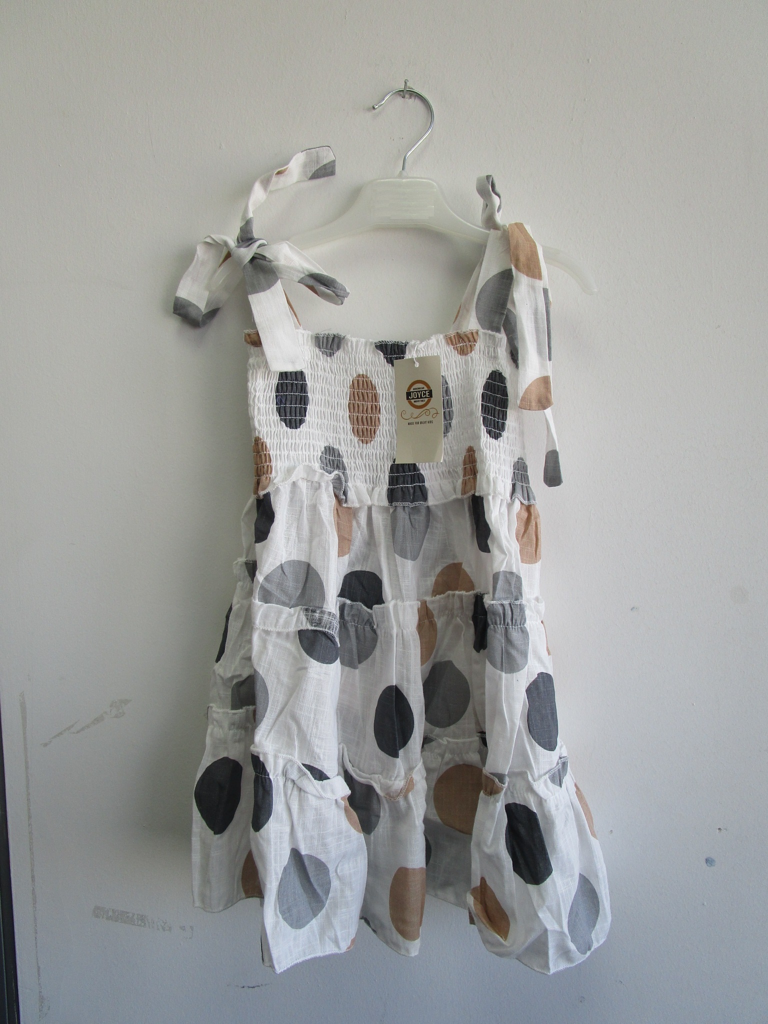 Imagen oficial de Girls' dress ; Joyce ; publicada por OECD