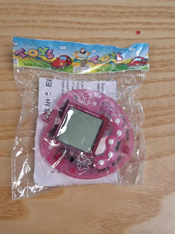 Official image of Tamagotchi ; Unknown ; Transparent Electronic Pets Tamagotchi 90s Nostalgic 49 Pets in One Virtual Cyber Digital Pet Toy published by OECD 3