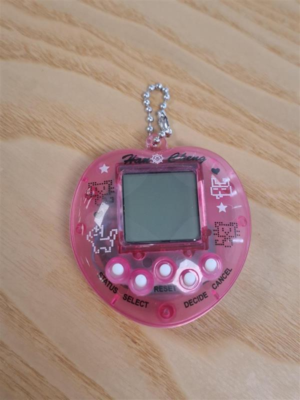 Official image of Tamagotchi ; Unknown ; Transparent Electronic Pets Tamagotchi 90s Nostalgic 49 Pets in One Virtual Cyber Digital Pet Toy published by OECD 6