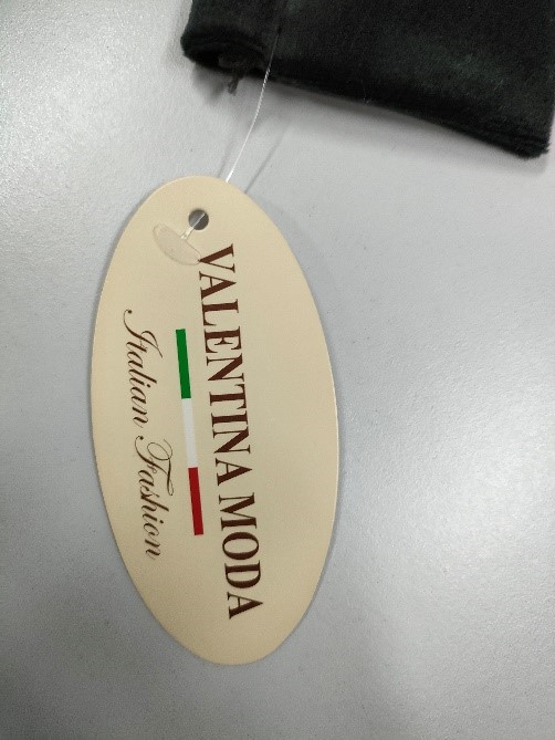 Official image of Children's dress ; Valentina Moda ; published by OECD 3