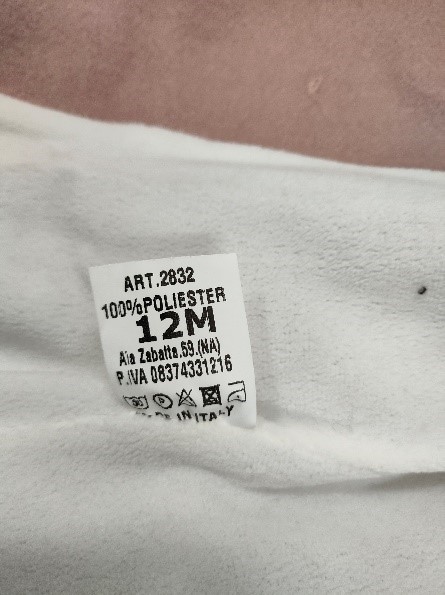 Official image of Children's coat ; Valentina Moda ; published by OECD 3