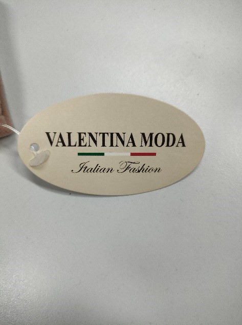 Official image of Children's coat ; Valentina Moda ; published by OECD 4