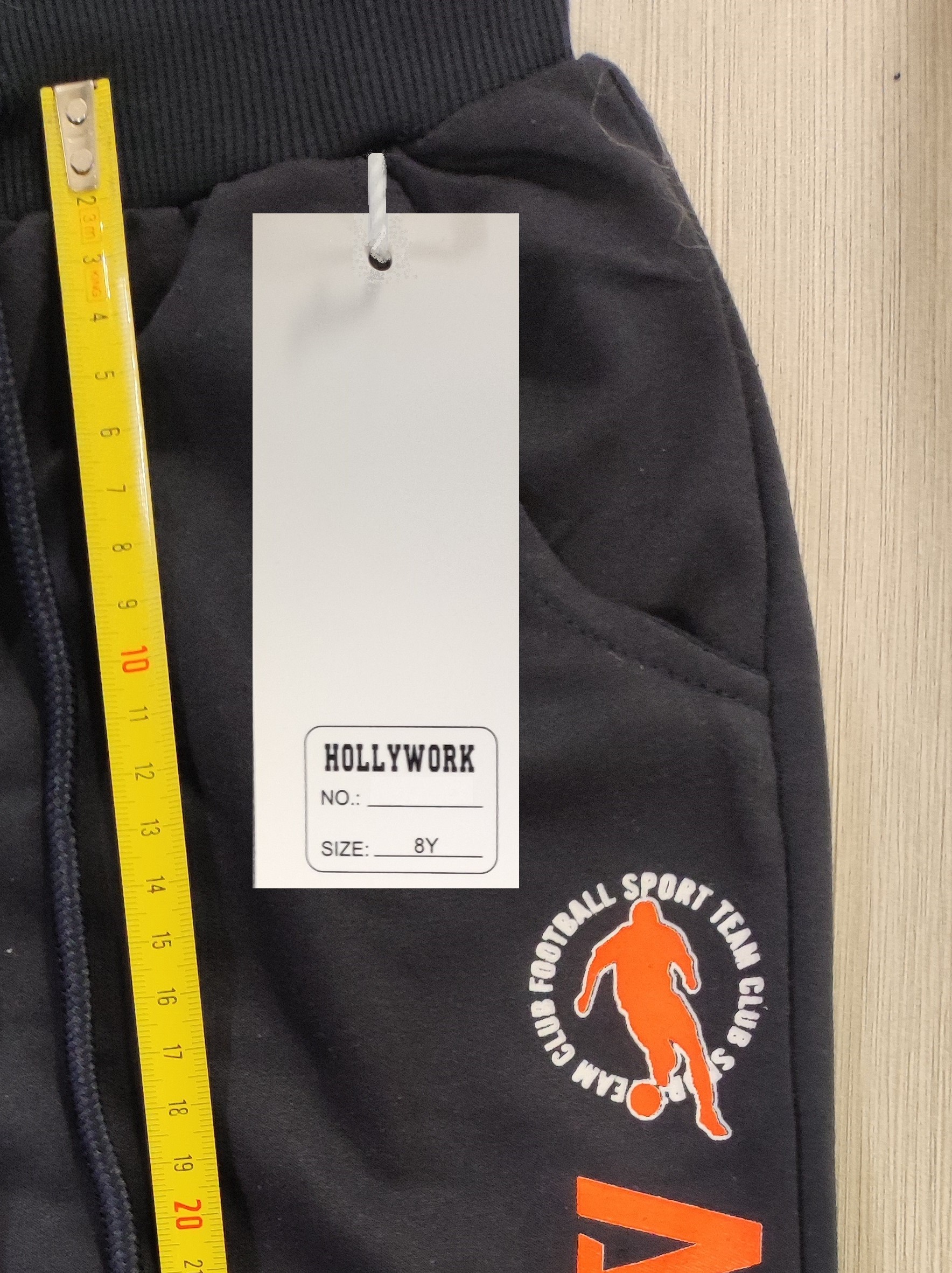 Official image of Sweatpants ; HOLLY WORK ; published by OECD 2