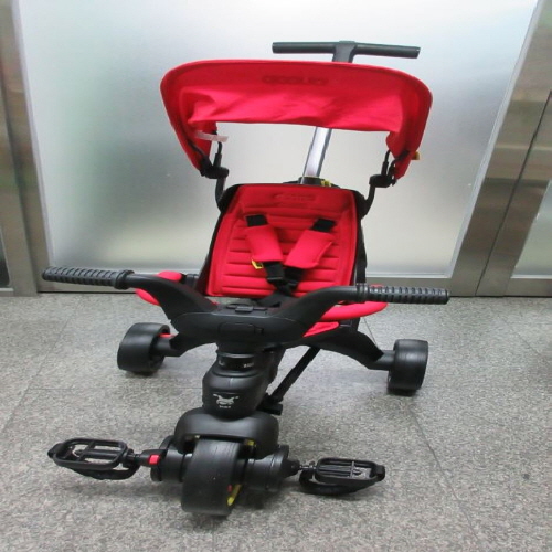 Official image of Tricycle for children published by OECD 2