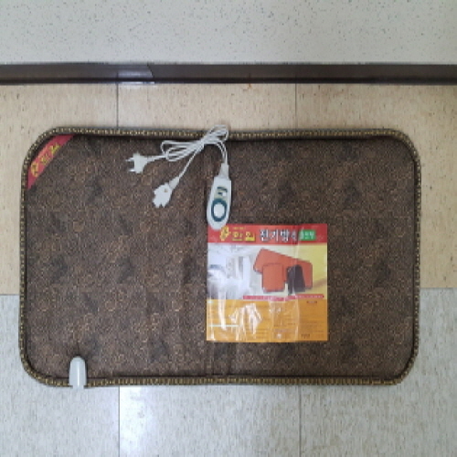 Official image of Electric heated pad published by OECD