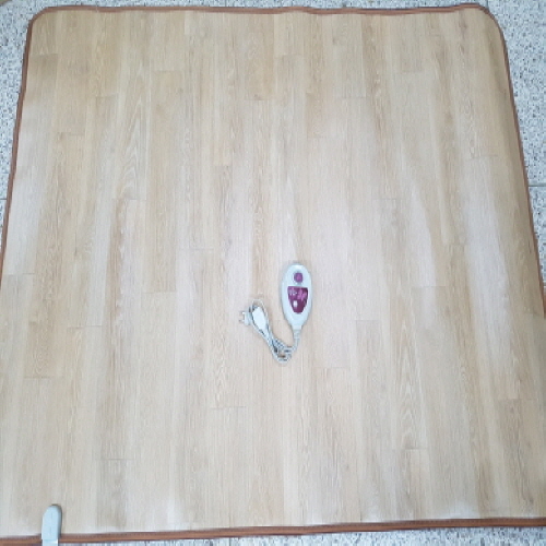 Official image of Electric heated mat published by OECD