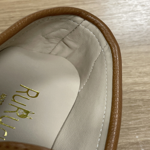 Official image of Leather product for children published by OECD 2
